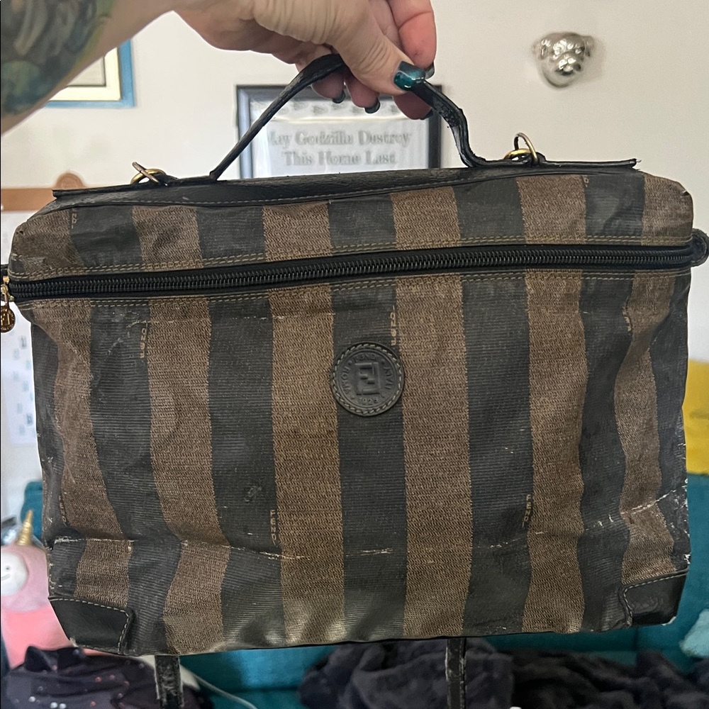 Project Fendi! It looks good with the distress but peeling leather